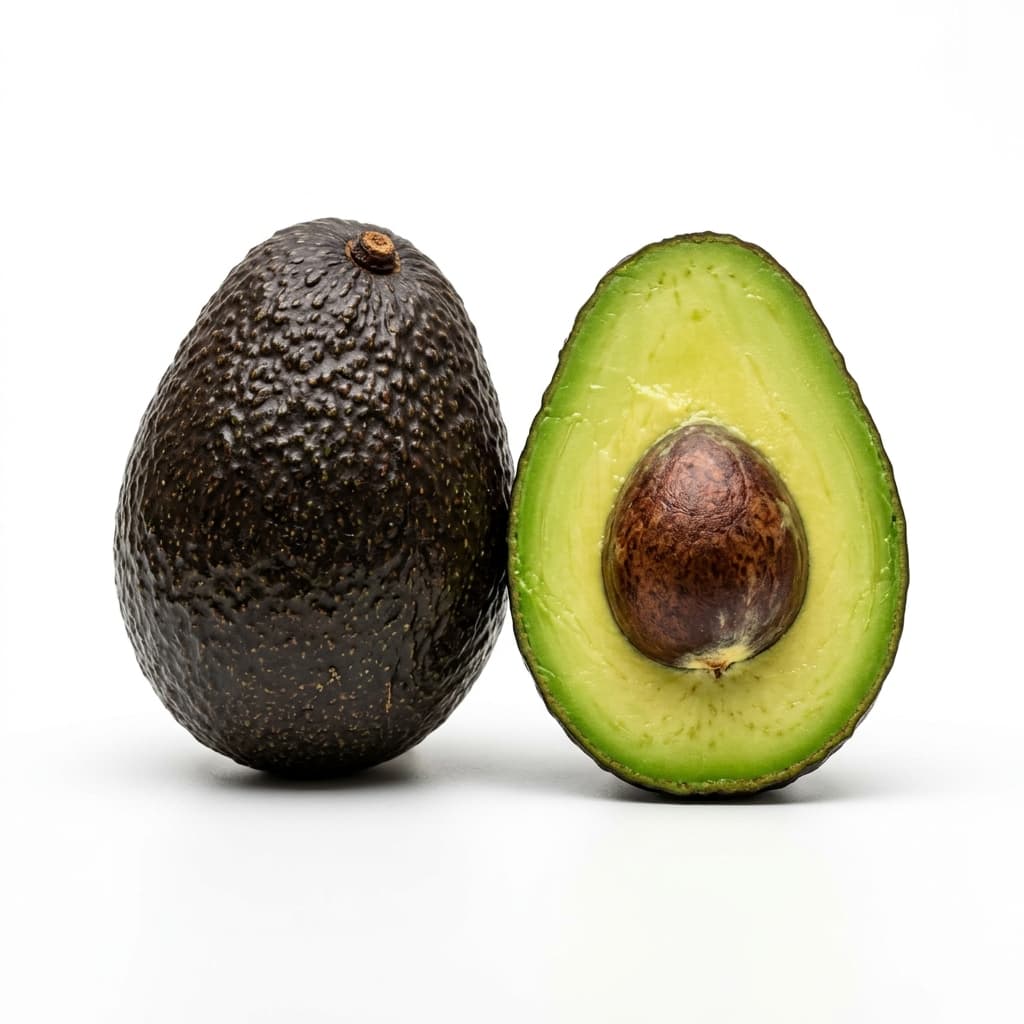 Halved avocado with seed